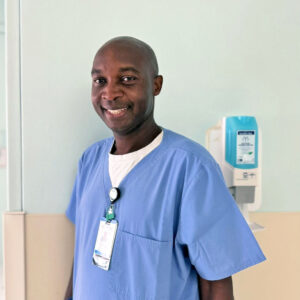 Male nurse in blue scrubs